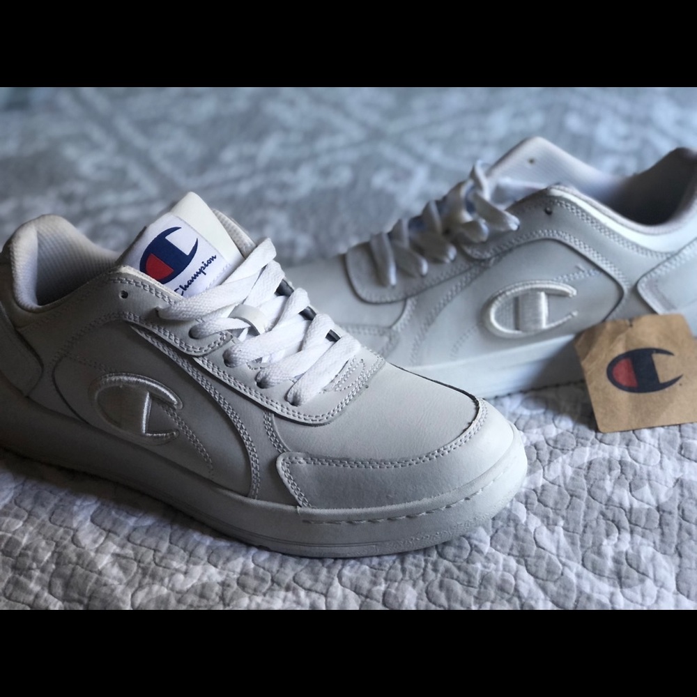 All white champion shoes with tag 9.5